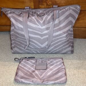 Coach zebra print bag with attached mini pouch